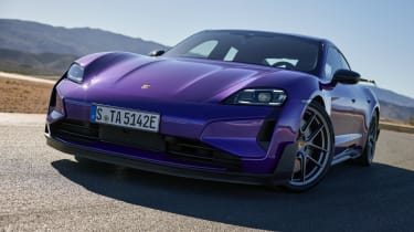 Porsche Taycan Turbo GT on display, showcasing its aerodynamic stance and performance-focused design